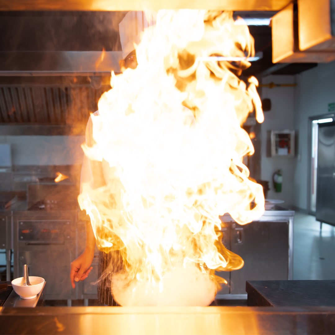 Restaurant Kitchen Fire from a chef's cooking